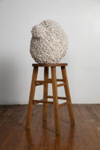 Melissa Dorn, "High Maintenance," Mop, foam, 1000 t-pins, wood stool. 40 x 14 x 14 in.